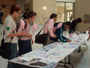 Students Sign  Banner While Enjoying Cotton Candy
